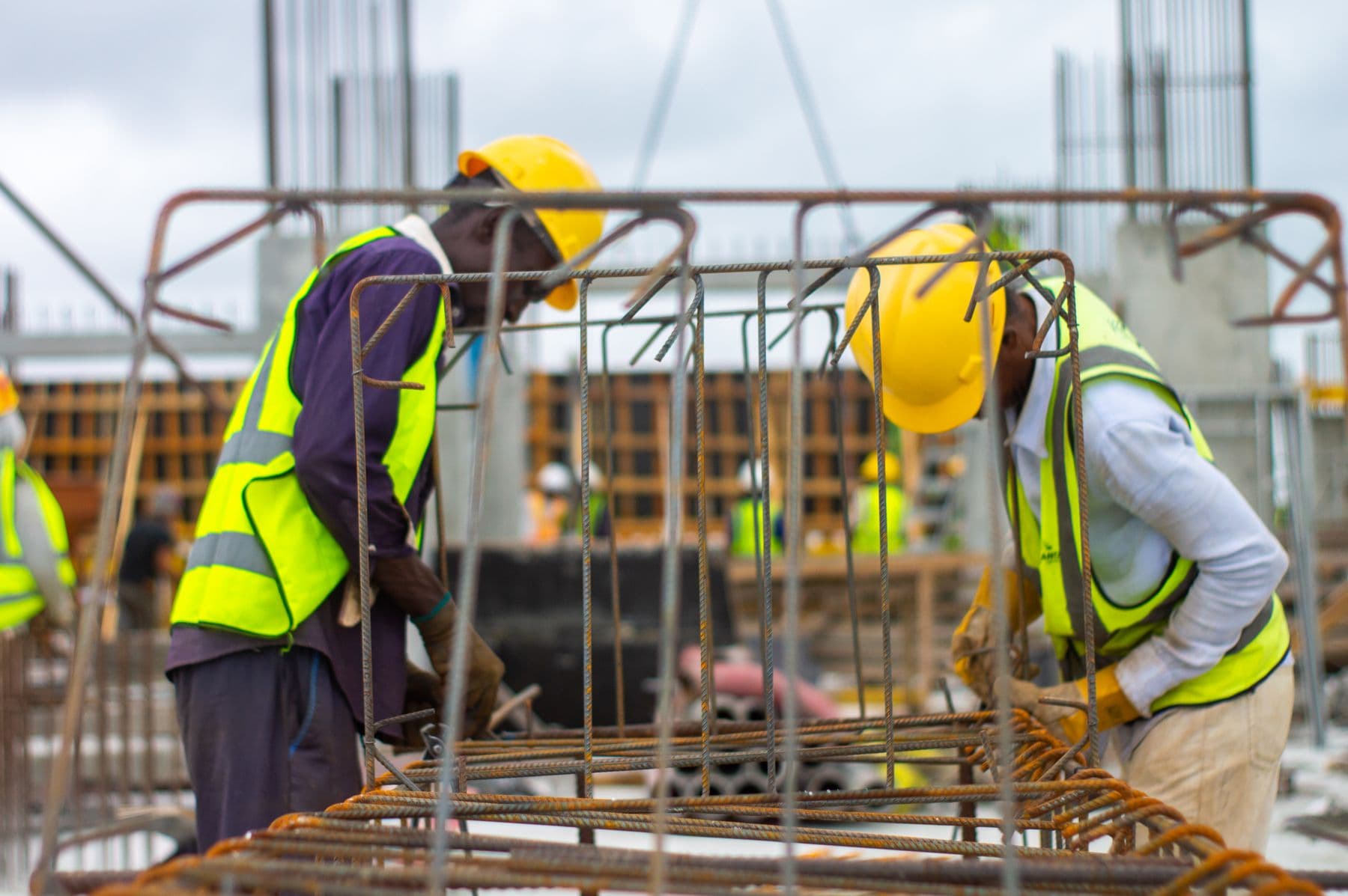 Construction team wearing safety equipment at a project site
