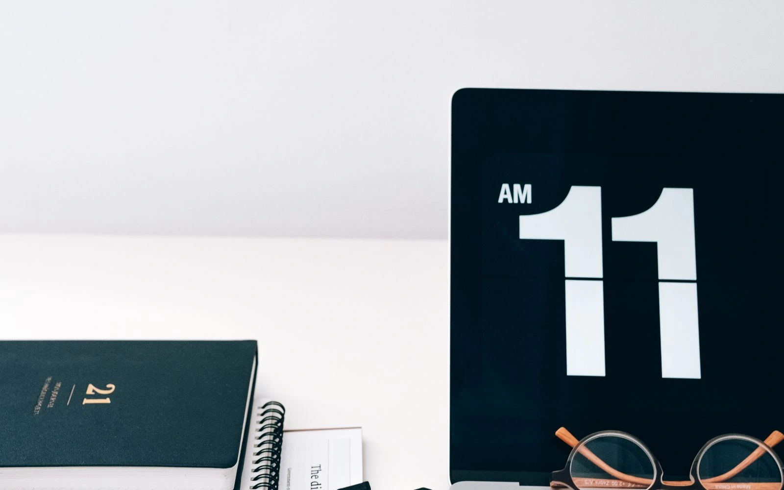 Laptop phone and calendars ready for scheduling