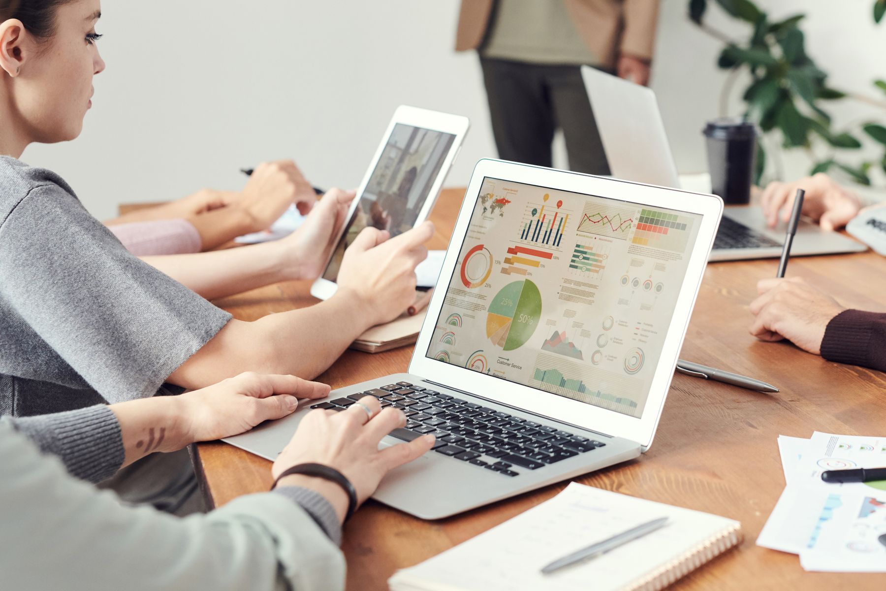 Creative team reviewing content and campaign data in a meeting